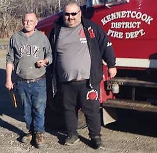 <p>FACEBOOK PHOTO/GREENFIELD FIRE DEPARTMENT</p><p>Greenfield firefighter Jason Roy (left) gives Kennetcook Fire Chief Steve White a loonie for the Hants County department&#8217;s tanker truck, which was picked up April 19.</p>