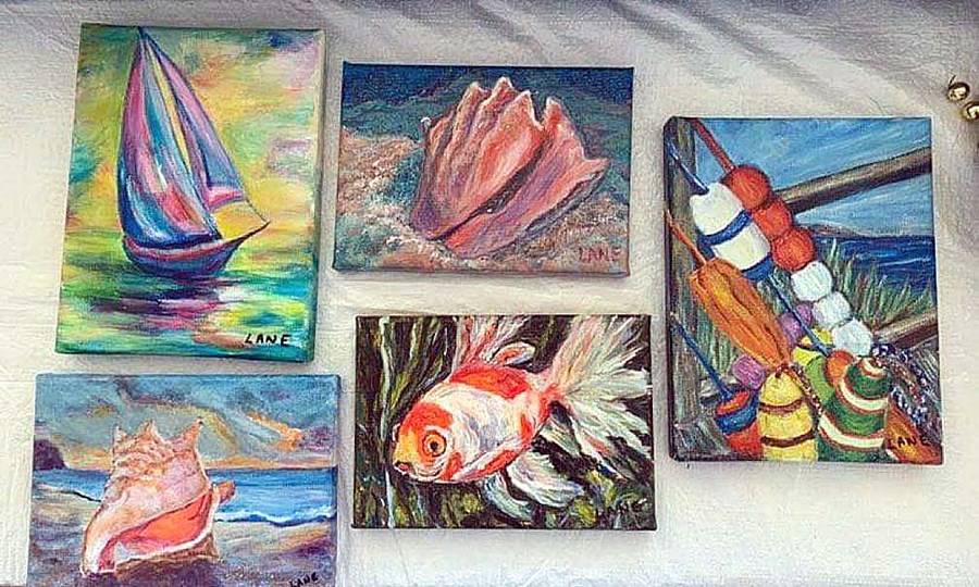 <p>SUBMITTED PHOTO</p><p>An assortment of Lane McLelan&#8217;s paintings that she hides on various trails throughout Lunenburg. She protects them in a plastic bag and asks anyone who finds one to send a picture to the cell phone number, email address, or Facebook page that she writes on a note within the bag.</p>