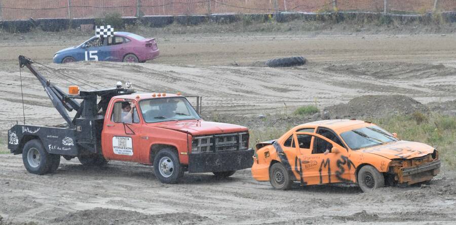 <p>KEVIN MCBAIN PHOTO</p><p>Needing a little help. This driver was given a little push off the track during one of the races at the Roughneck Off Road Stock car races.</p>