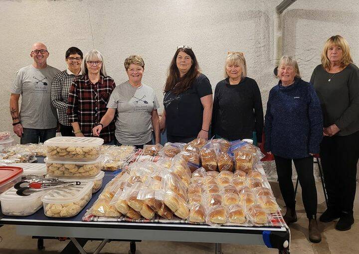 <p>CONTRIBUTED PHOTO</p><p>A good group of people came together to help David and Karen Jarvis pack up some delicious food for the clients of the Lunenburg Food Bank for Christmas.</p>