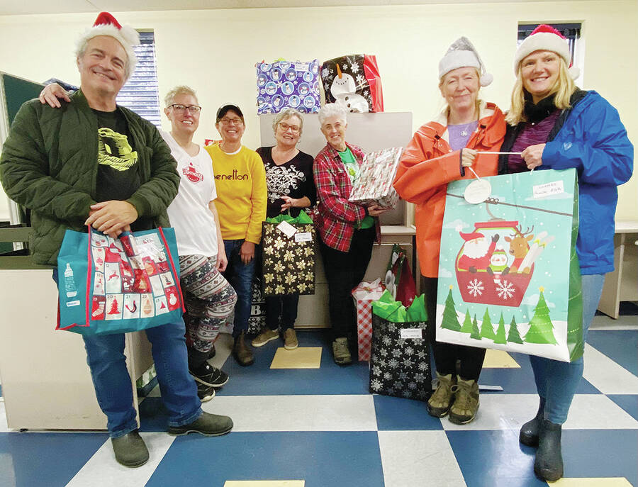 <p>Kevin McBain PHOTO</p><p>A few of the folks that help organize and deliver gifts with the Santa&#8217;s for South Shore Seniors program. From left to right, Reinier DeSmit, Shannon Stewart, Jen Zweschper, Janice Cositan, Jayme Rowart, Karen Pinsent and Nancy Petrie.</p>